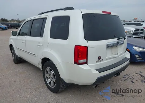 2011 Honda Pilot Touring z USA, uszkodzony, nr VIN 5FNYF3H91BB054577